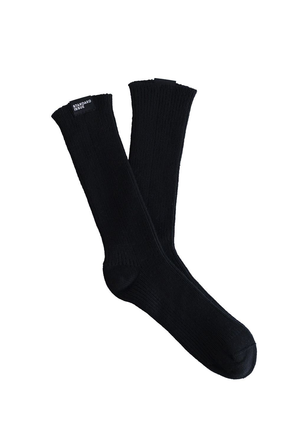 Standard Issue 100% merino black socks on a white background