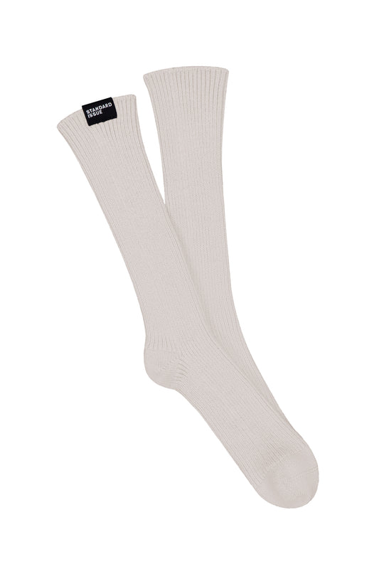 Standard Issue 100% merino alabaster white socks on a white background